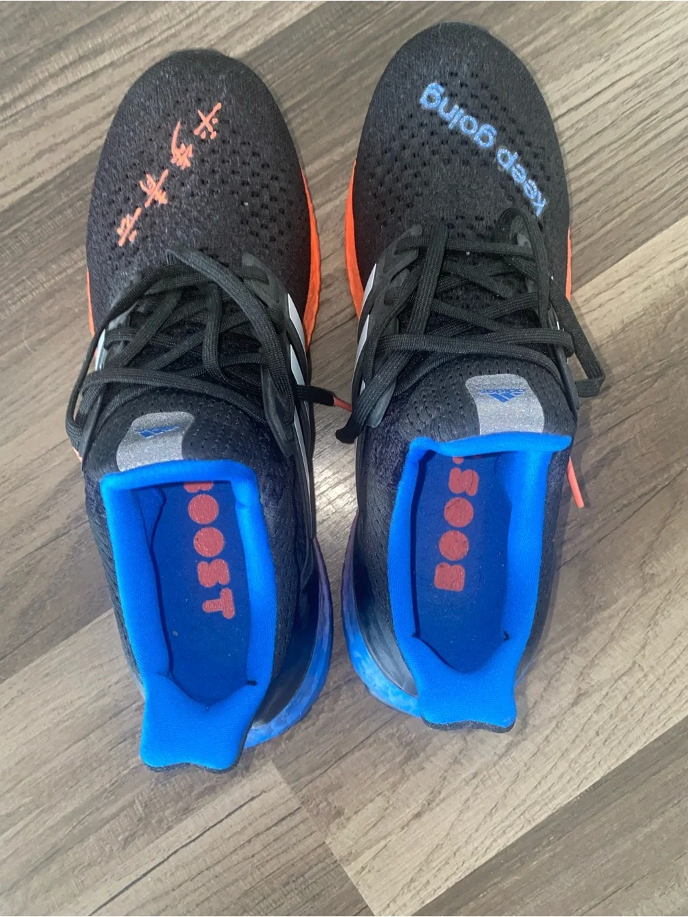 adidas Ultraboost men/women KEEP GOING Black Sneakers Blue and Orange Accents